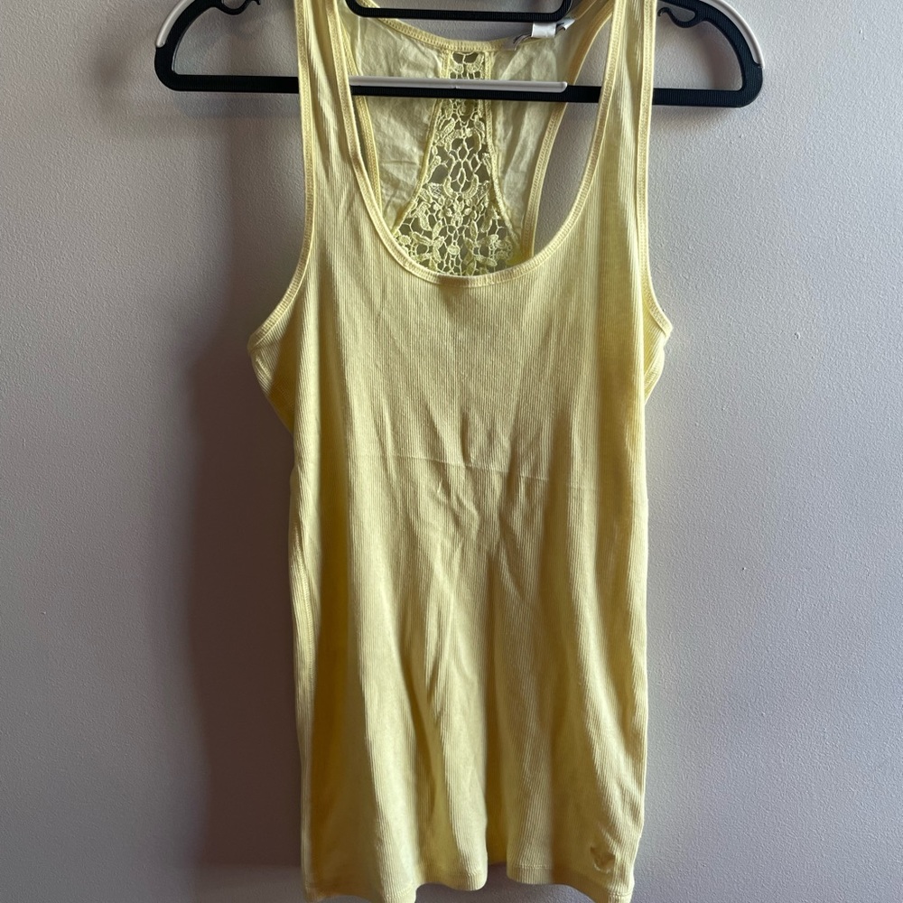 Yellow American Eagle lace racer back tank top.